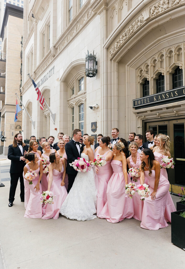 Wedding party portrait outside of Hotel Kansas City